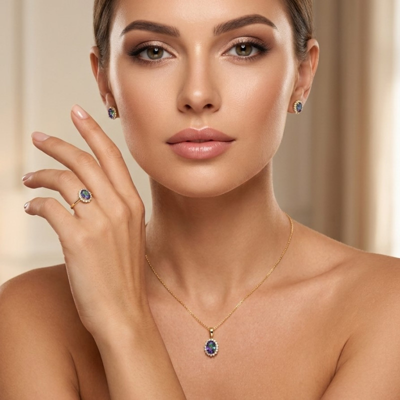 Pierścionek złoty owalny z cyrkonią mystic topaz
